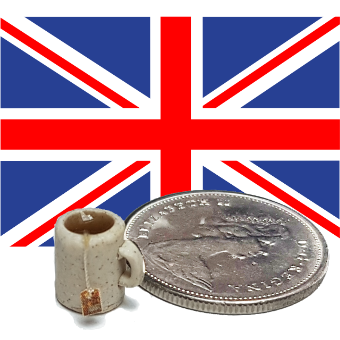 Mug of tea in 12th scale beside a coin, in front of a flag of the United Kingdom